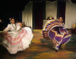 Women dancing in traditional dress