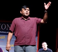 A man performing on stage