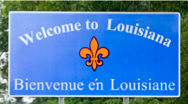 A Welcome to Louisiana sign in English and French