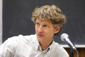 A man speaking into a microphone