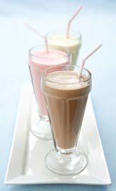 Three milkshakes on a tray