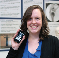 A young woman with an iPod touch